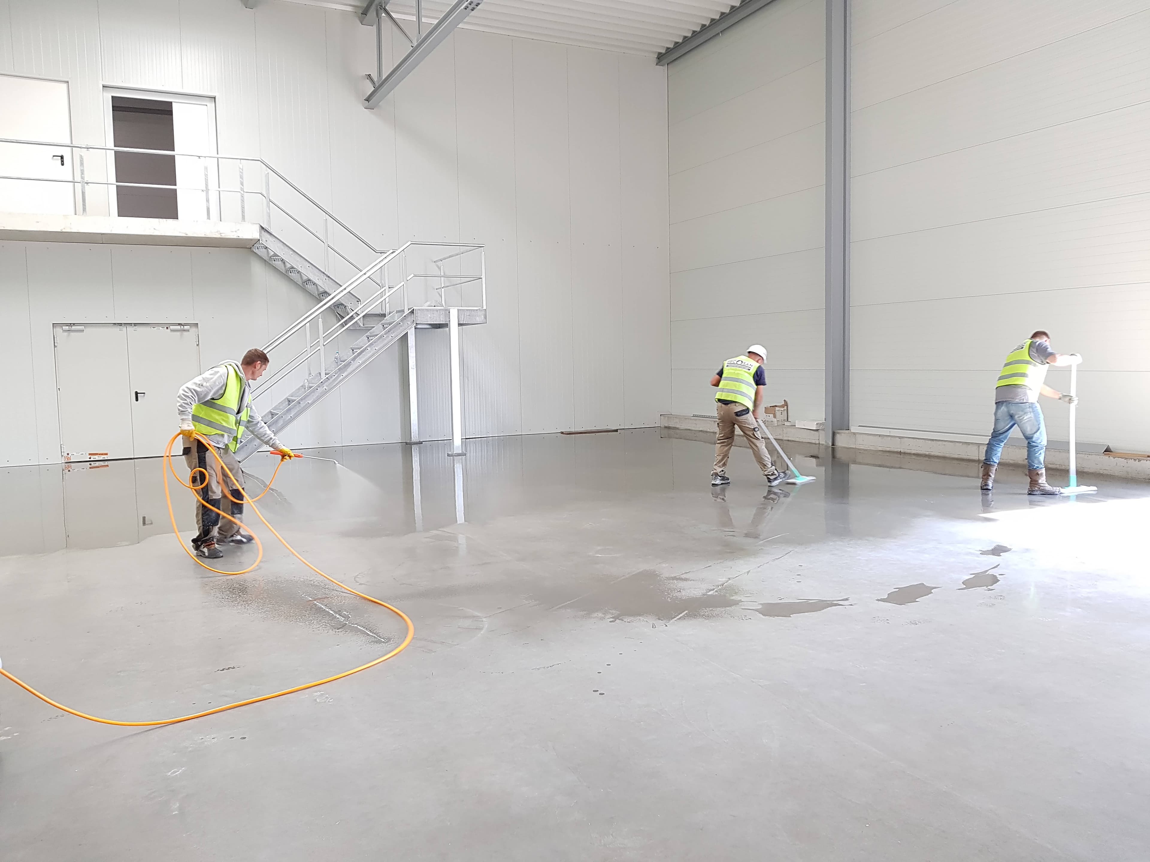 People cleaning a building after construction